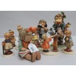 Nine Goebel china figures: to include a girl reading a book  4"h