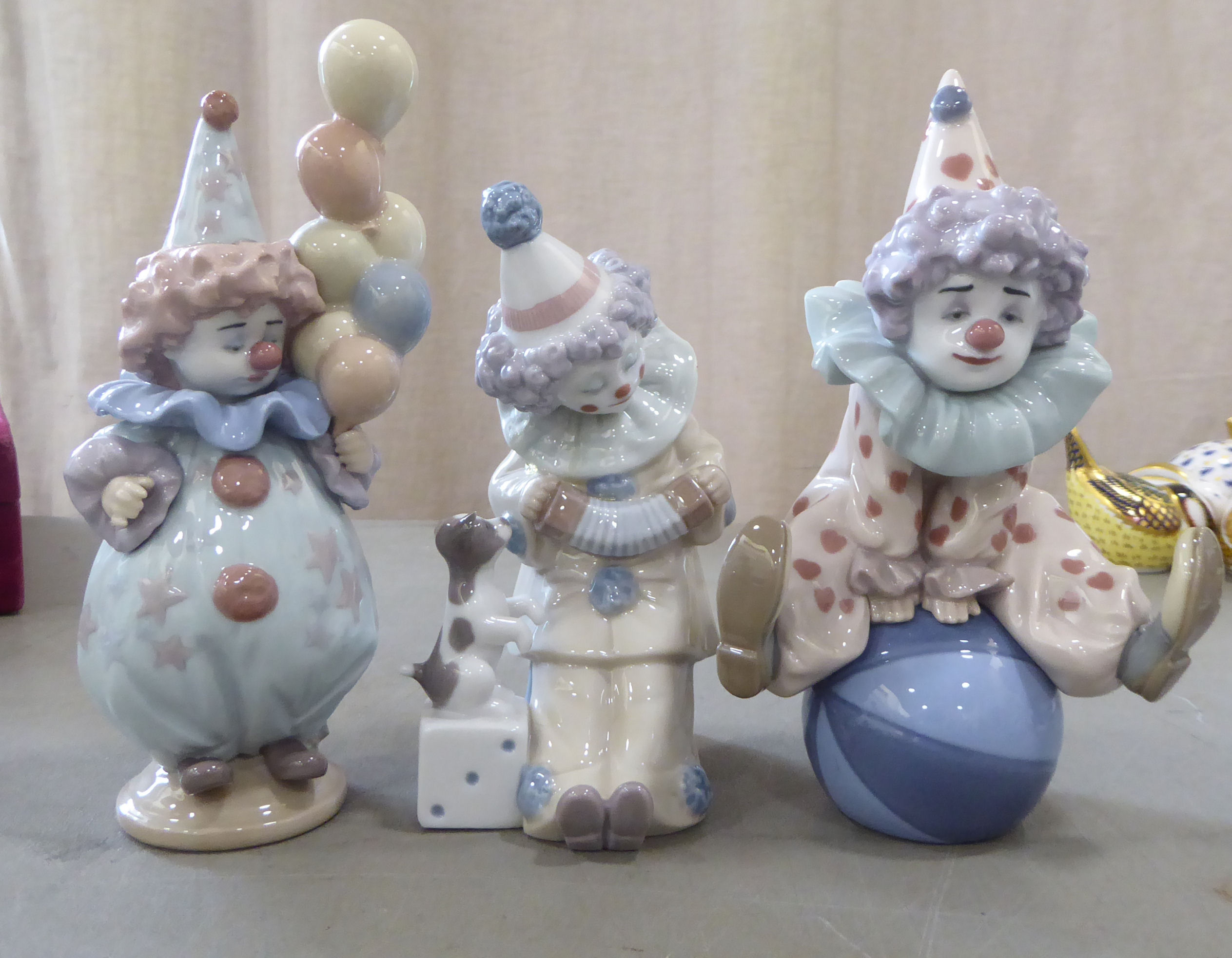 Seven Lladro porcelain clown themed figures: to include one playing a saxaphone  7"h - Image 4 of 5