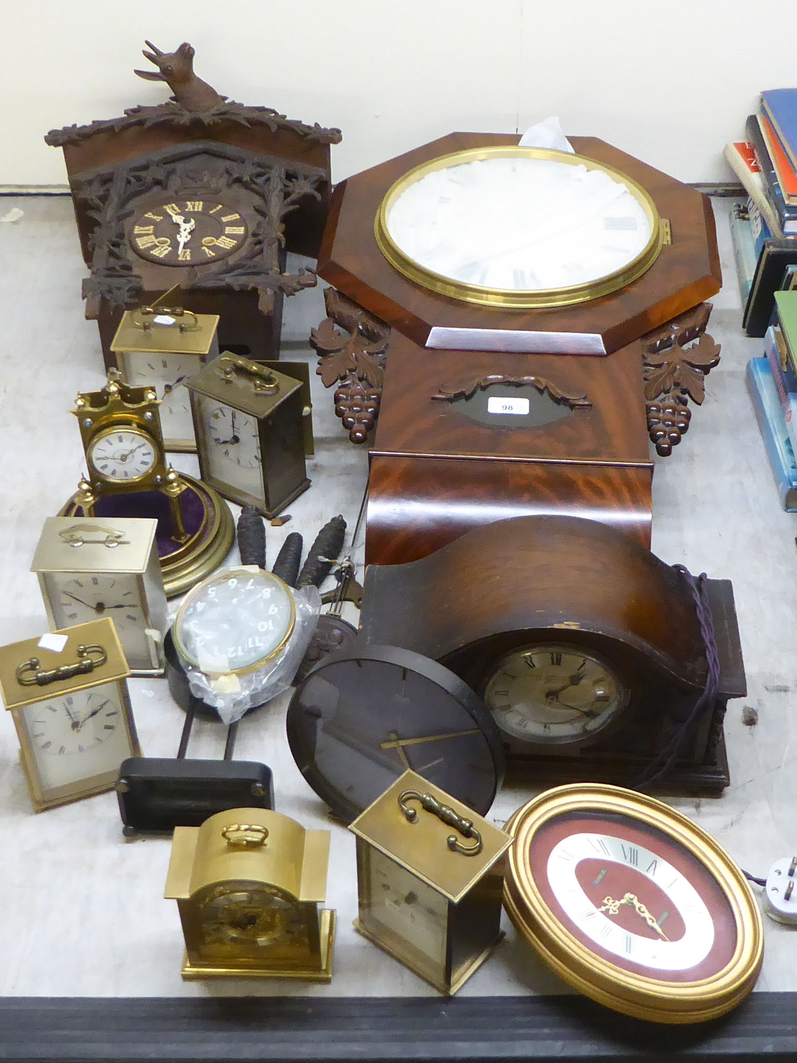 A mixed lot: to include a 20thC Black Forest inspired, carved, stained beech cased cuckoo clock