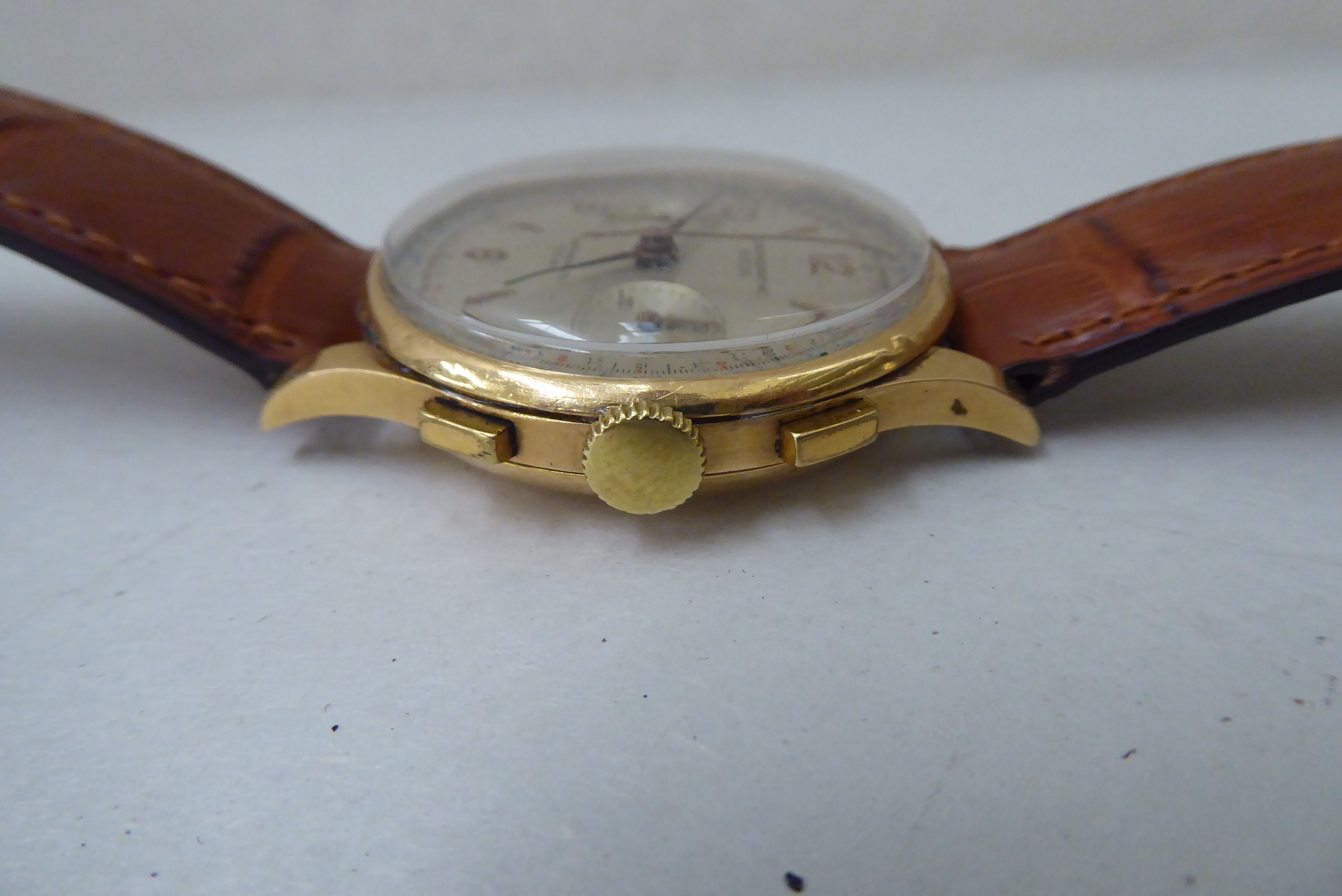 A Chronograph Suisse 18ct gold cased wristwatch, the antimagnetic 17 jewel movement, faced by a - Image 6 of 7