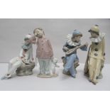 Four Nao porcelain figures: to include a sleeping boy  6"h