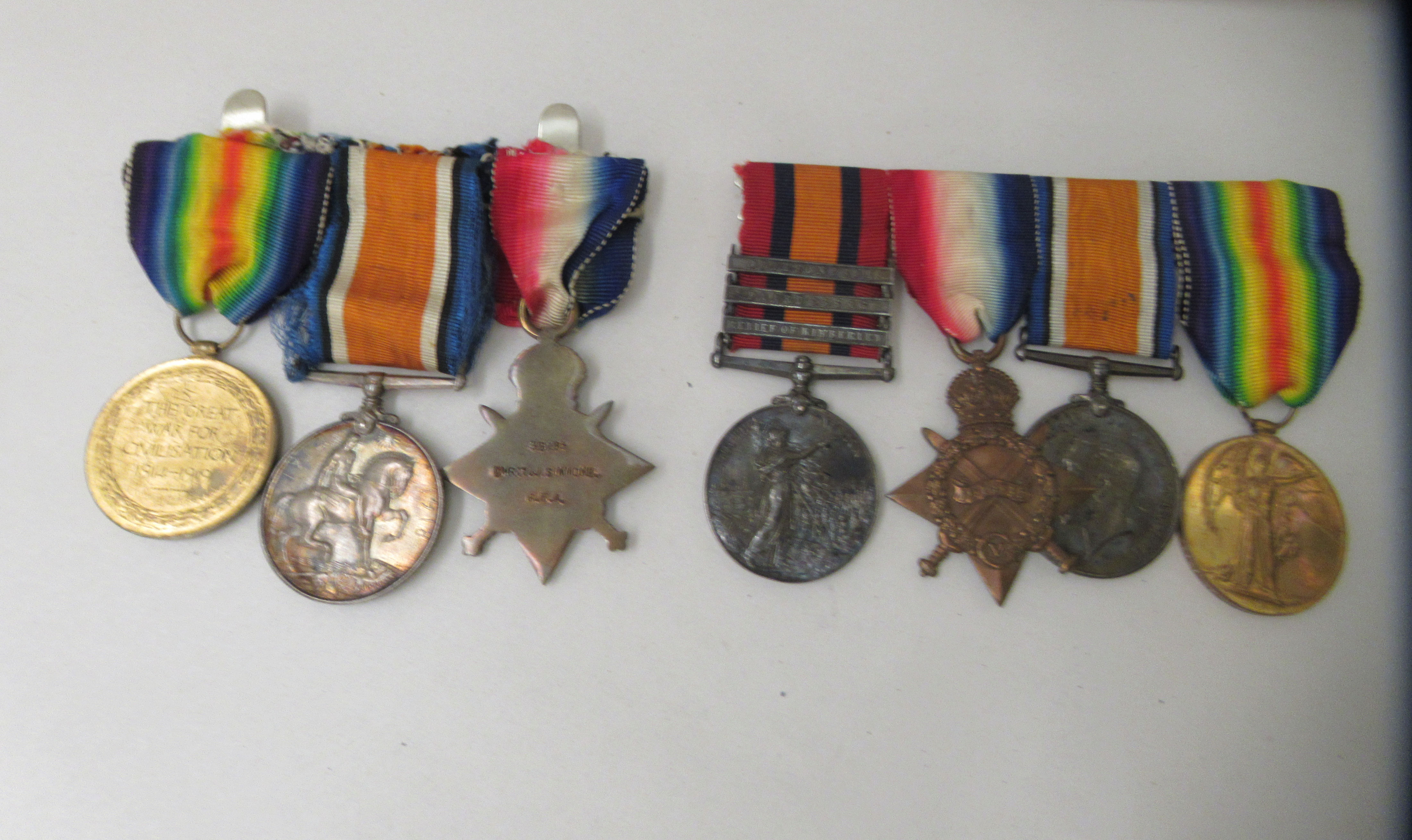 A Great War medal group, comprising seven in the name of one DUR T.J Simmons, on ribbons: to include