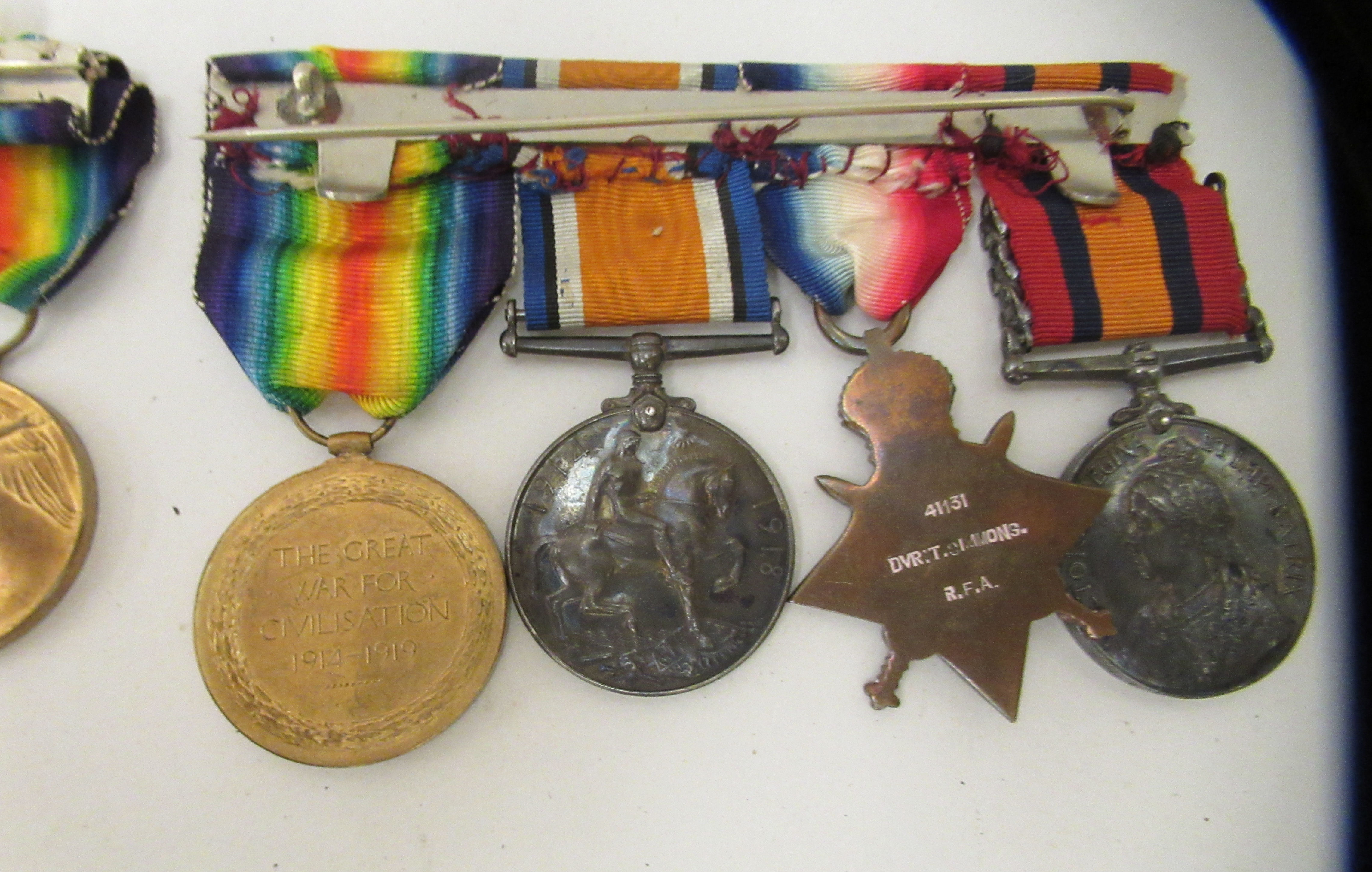 A Great War medal group, comprising seven in the name of one DUR T.J Simmons, on ribbons: to include - Image 4 of 5