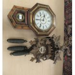 Two clocks: to include a modern Black Forest inspired carved and stained beech framed cuckoo