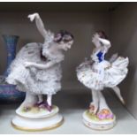 Two early 20thC Continental porcelain figures, two female dancers  11"h