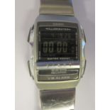 A Casio Futurist stainless steel cased bracelet watch, faced by a digital dial