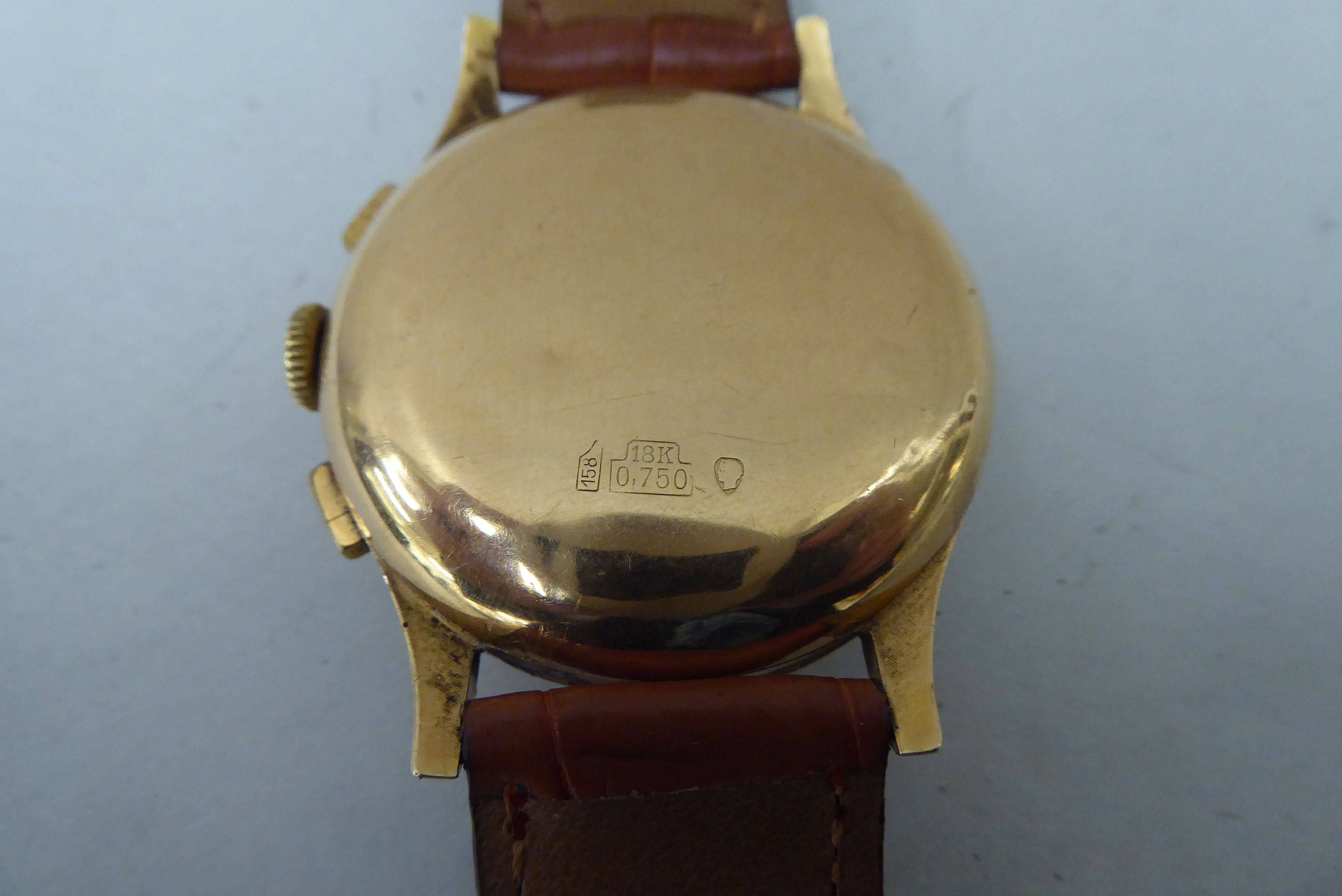 A Chronograph Suisse 18ct gold cased wristwatch, the antimagnetic 17 jewel movement, faced by a - Image 5 of 7