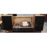 An Hitachi stereo music centre, model no. SDT 7640; and a pair of teak effect cased speakers,