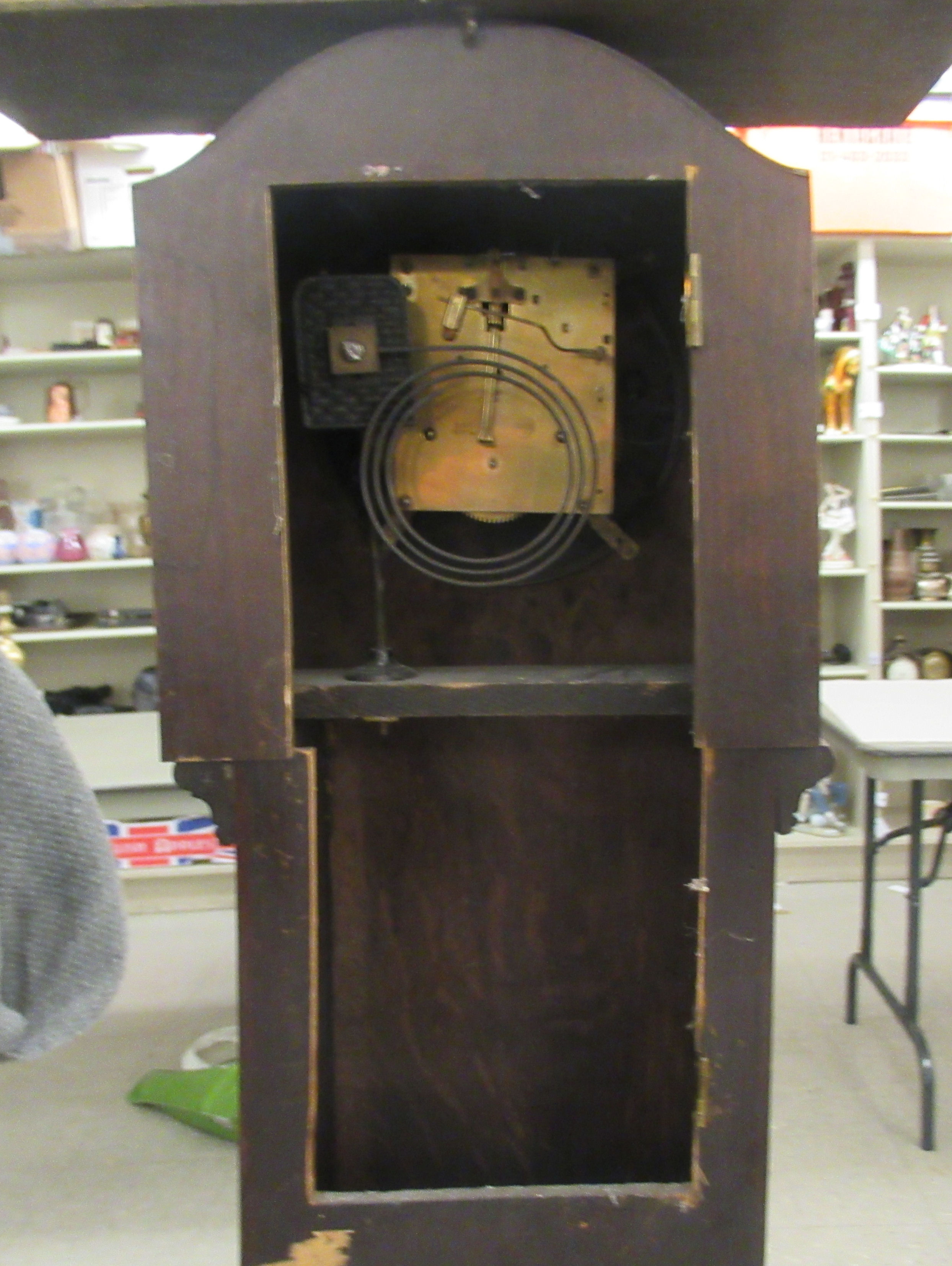 A 1930s oak cased granddaughter clock; the 8 day movement faced by a silvered Arabic dial  52"h - Image 2 of 3