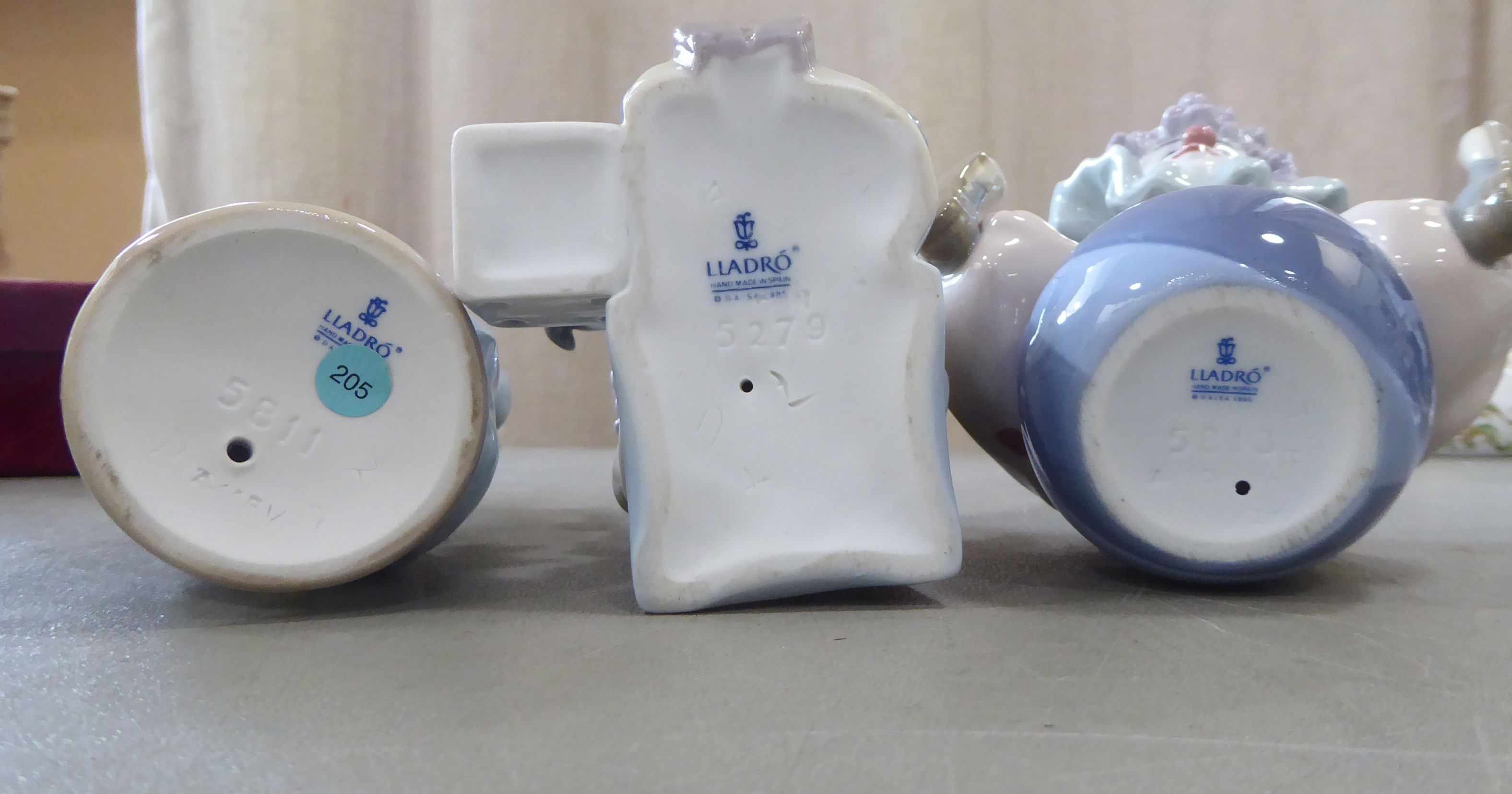 Seven Lladro porcelain clown themed figures: to include one playing a saxaphone  7"h - Image 5 of 5