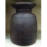 An antique effect ring turned wooden vase  10"h