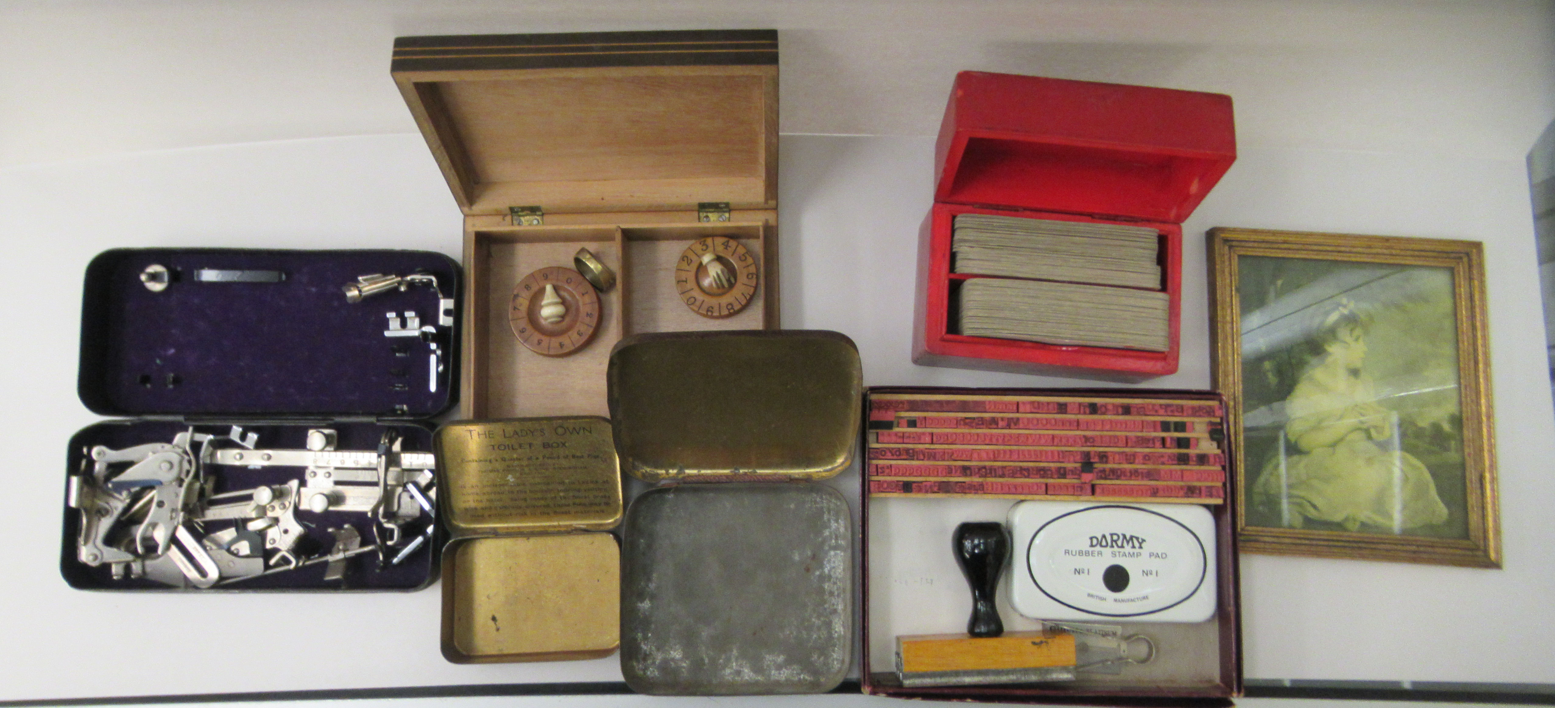 A mixed lot: to include playing cards; Singer components; and a trench art ring