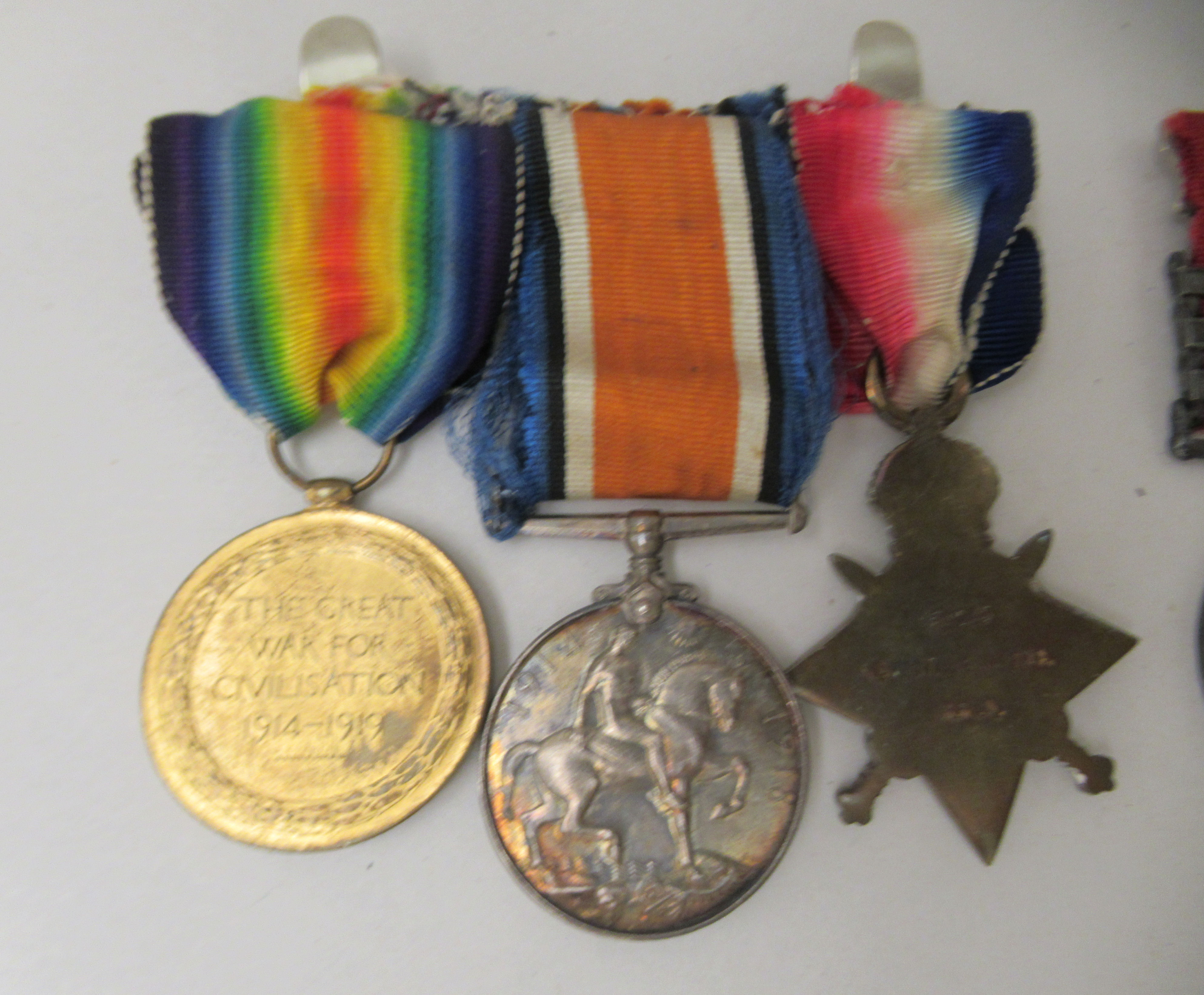 A Great War medal group, comprising seven in the name of one DUR T.J Simmons, on ribbons: to include - Image 2 of 5