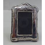 A silver mounted photograph frame, on an easel back  stamped 925  2.5" x 3.5"