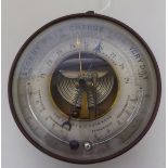 An early 19thC French copper cased combination thermometer and aneroid barometer, the engraved,