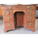 An early 20thC ladies crossbanded mahogany desk, raised on bracket feet  30"h  36"w