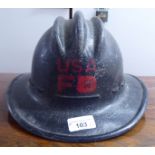 A fibreglass fire fighters helmet, branded for USA (Please Note: this lot is subject to the