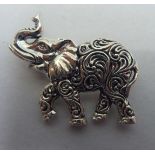 A silver brooch, fashioned as a trumpeting elephant  stamped Sterling