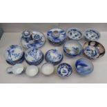 20thC Oriental ceramics: to include three Provincial Japanese porcelain plates, decorated in blue