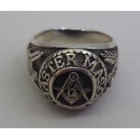 A gentleman's silver ring, decorated with Masonic devices