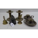 Metalware: to include a pair of 20thC bronze candlesticks  5"h