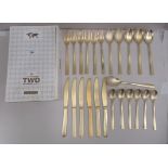 A twenty-four piece set of Seletti Midas yellow metal cutlery, retailed by Heals  boxed