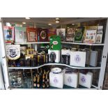 An extensive collection of Guinness memorabilia: to include unopened bottles, commemorating