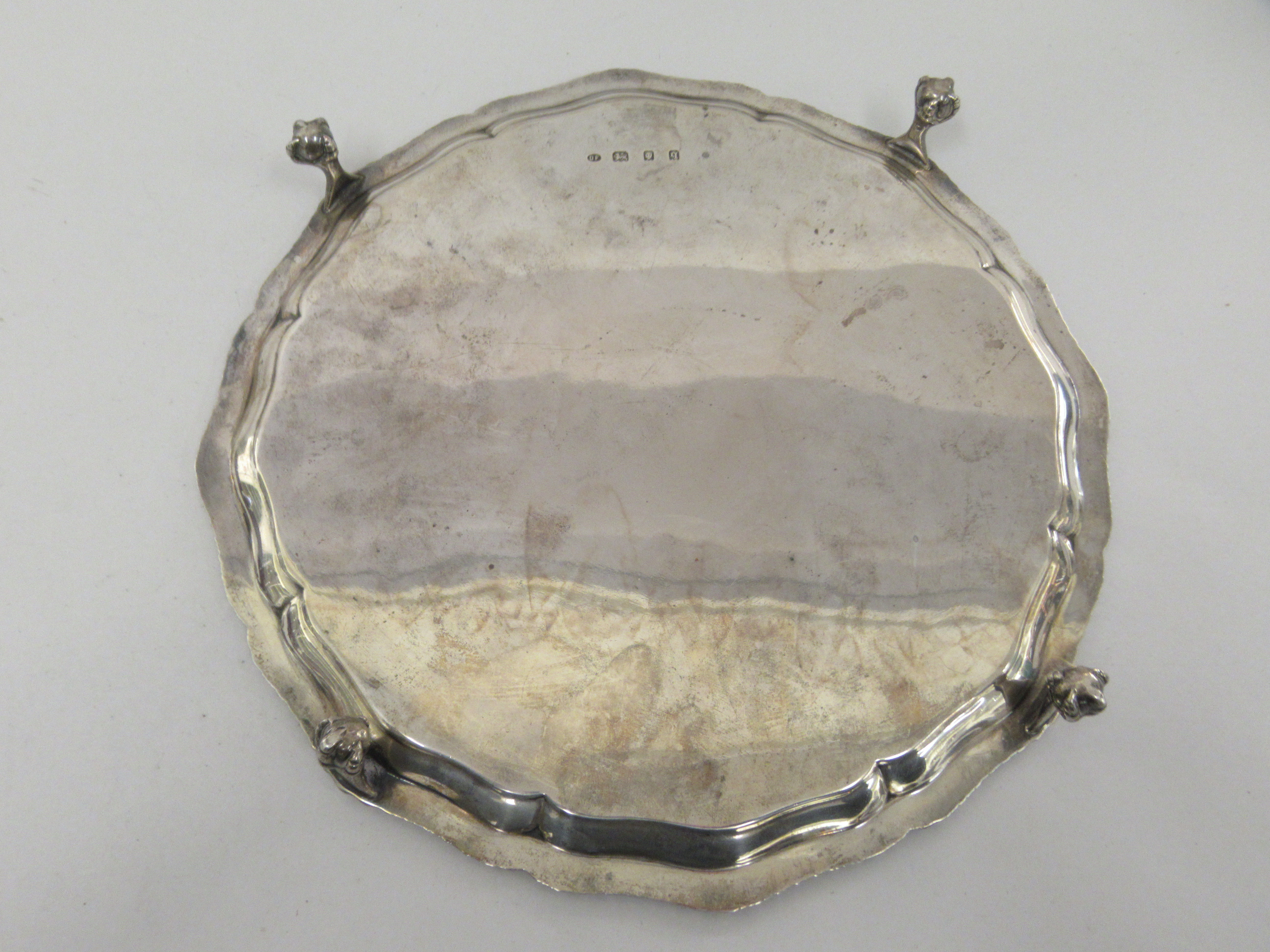 A Georgian style silver salver with a raised piecrust and gadrooned border, elevated on talon and - Image 6 of 7