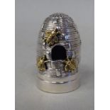 A novelty silver combination thimble and pin cushion, fashioned as a beehive  stamped Sterling