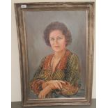 L Roberts - a half-length portrait of a seated woman  oil on panel  bears a signature & dated '98