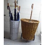 A wicker bound shopping trolley; a white painted wicker stickstand  21"h; and a selection of