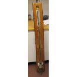 A 20thC Negretti & Zambra lacquered brass Fortin stick barometer, range 26 to 32 inHg 650 to