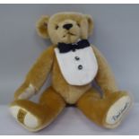 A Merrythought David Emmanuel plush covered Teddy bear with a growler  14"h