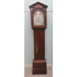 A mid/late 18thC oak longcase clock, the hood having a pointed arch pediment, round arch window