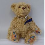 A Steiff plush covered Teddy bear  no.01646 with a button  9"h