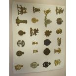 Approx. twenty-four military regimental cap badges and other insignia, some copies: to include The