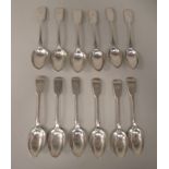 A matched set of twelve late Victorian silver fiddle pattern fruit spoons  mixed marks  approx. 9.