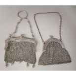 An early 20thC Sterling silver chainmail purse with a ball clasp; and another, having an engraved