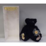 An Alpha-Farnell by Merrythought black plush covered Teddy bear with sweeps brush and growler  15"h