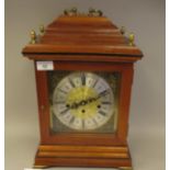 A modern Timecraft mahogany cased and brass mounted bracket clock of traditional design with a