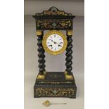 A 19thC French ebonised and intricately inlaid portico clock with a traditional canopied case, on