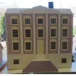 A Georgian style three storey dolls house with a basement and a hinged front  39"h  41"w