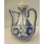 A Chinese porcelain Ming style bulbous ewer, having a cover, loop handle and spout, decorated in