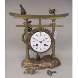 A late 19th/early 20thC Continental, lacquered and painted brass cased novelty, mantel clock,