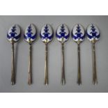 A set of six silver coffee spoons with decoratively blue and white enamelled bowl backs  T&S
