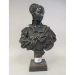 After Bouret - a cast and black painted metal bust, a woman wearing 17thC costume, on an