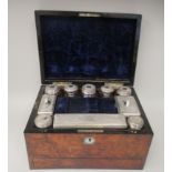 A late 19thC figured walnut veneered and ebonised vanity box with straight sides, a hinged lid, base