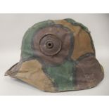 A German World War I military steel camouflage helmet with a liner and chinstrap (Please Note: