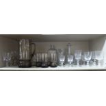 Glassware: to include pedestal wines; a decanter; a cordial jug; and five glasses