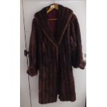 A vintage two tone, three-quarter length fur jacket